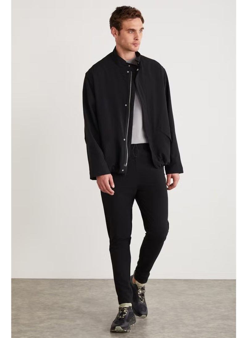 GRIMELANGE Roger Men's Stretchy Technical Fabric Thick Zippered Lined Sleeve Cuffed Flap Pocket Black Jacket - Image 2